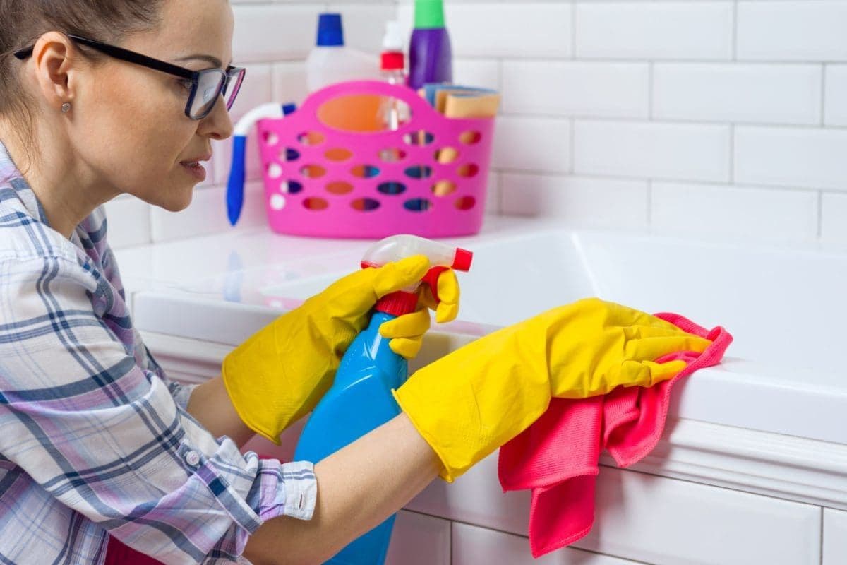 house-cleaning-woman-is-cleaning-in-the-bathroom-2022-01-20-20-07-22-utc-scaled-e1666206366433.jpg